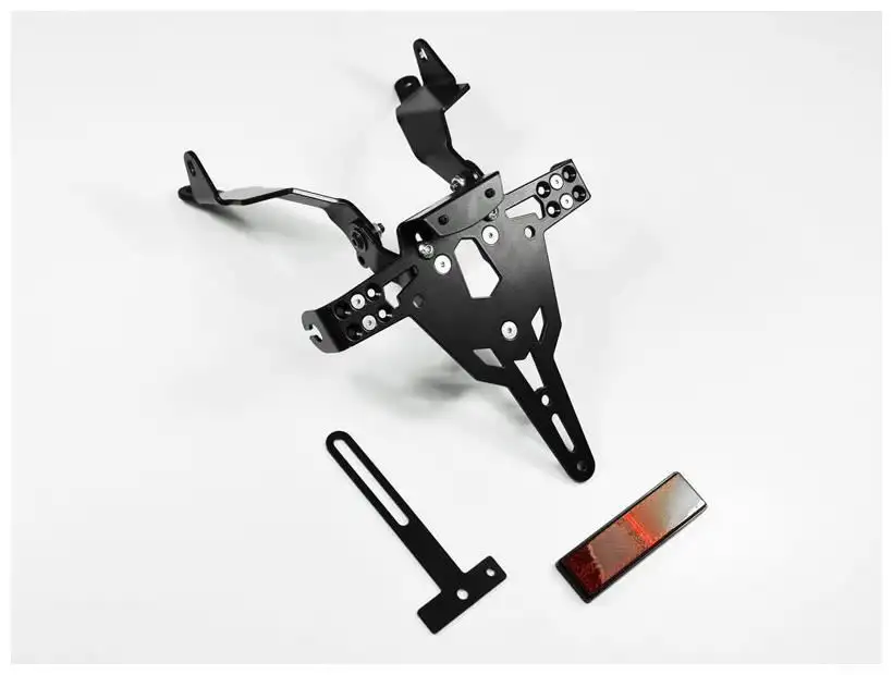 KIT Portatarga PRO Ibex Zieger per Aprilia RS 125 08-12 regolabile con Lucetarga LED + Catadiottro